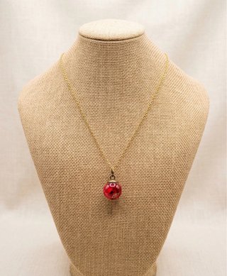 Collar tipo cascabel flores presevadas