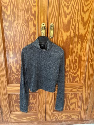 Top brillante manga larga gris