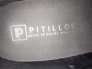 Botines negros con cordones y tacón
