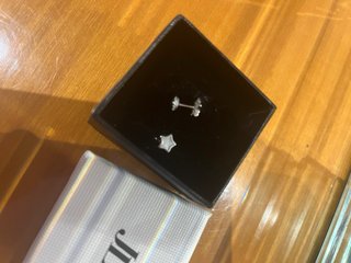 Pendientes de oro blanco con forma de estrella