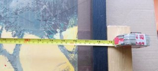 Cornice in legno nero e marrone