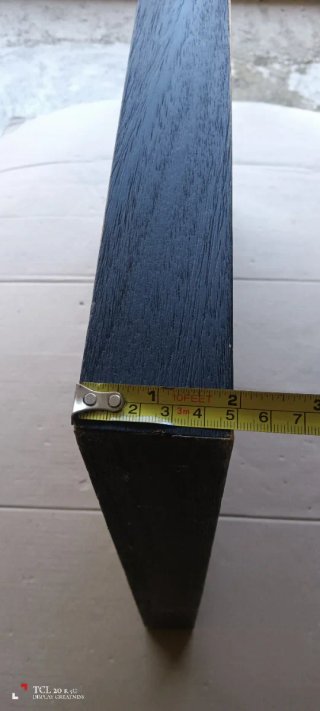 Cornice in legno nero e marrone