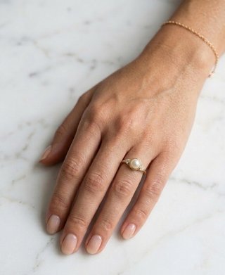Anillo oro 18k perla y diamantes