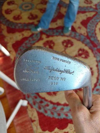 Palo de golf antiguo de madera de nogal Spalding
