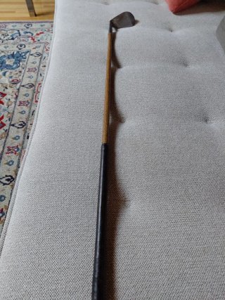 Palo de golf antiguo de madera de nogal Spalding