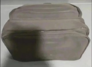 Bolso de mano beige y gris con cremallera