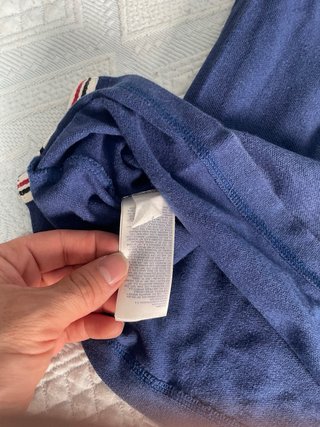 Polo tommy azul con parche de letra H