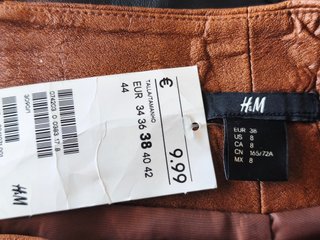 Minifalda marrón simil piel. H&M. T. 38