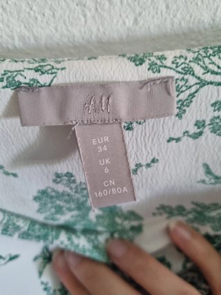 Top estampado verde y blanco de tirantes