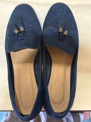 Manoletinas azules con borlas