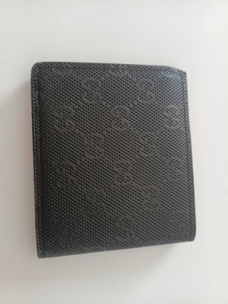 Cartera estilo Louis Vuitton gris con monograma
