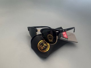 Gafas de sol Ray-Ban Clubmaster negras y doradas