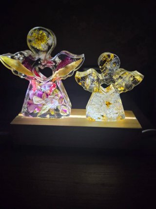 Luce notturna angeli resina fiori