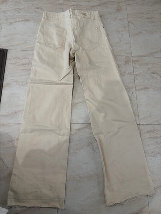 Pantalón beige roto ancho de tiro alto