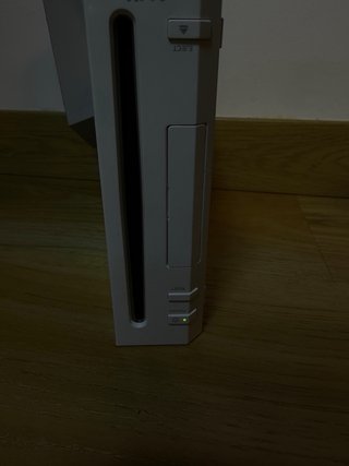 Nintendo Wii con transformador