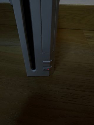 Nintendo Wii con transformador
