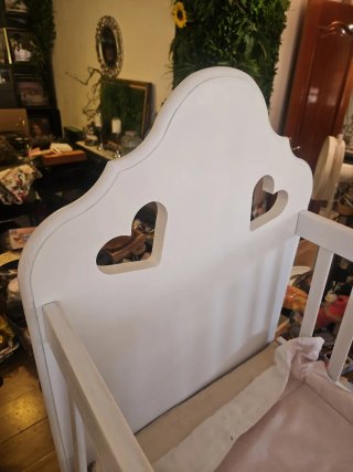 Cuna mecedora de madera para bebé