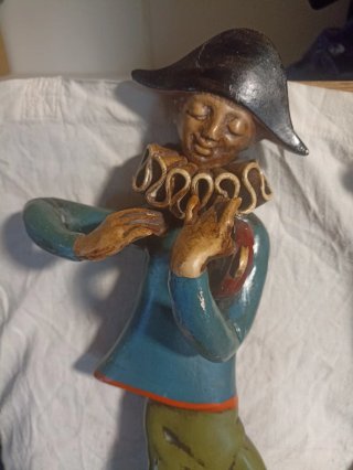 Arlequín de cerámica antiguo