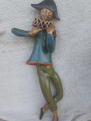 Arlequín de cerámica antiguo
