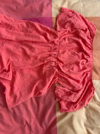 Mono naranja con volantes