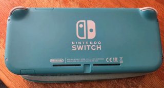 Nintendo Switch Lite Verde con funda Animal Crossi
