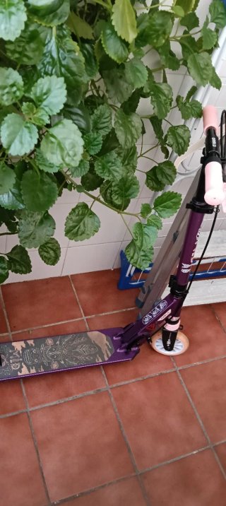 Patinete Oxelo morado niña