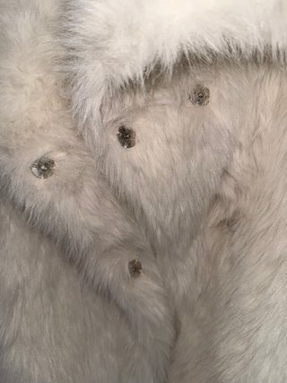 Abrigo de pelo blanco