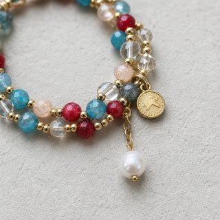 Pulsera multicapa con charm de moneda