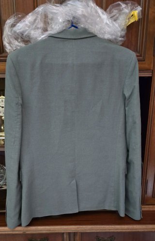 Traje verde para chico de H&M