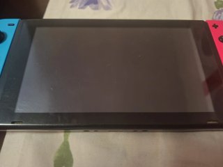 Nintendo Switch + Super Mario Odyssey