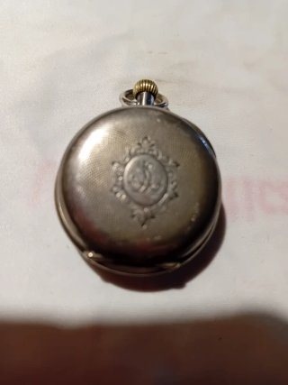 Antico orologio in argento