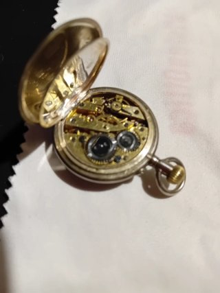 Antico orologio in argento