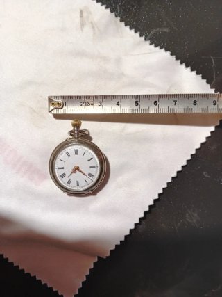Antico orologio in argento