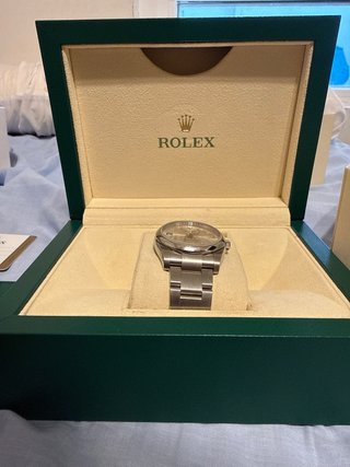 Rolex oyster perpetual cara gris