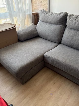 Sofá cama gris de tela