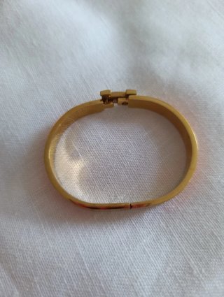Pulsera Hermes Dorada con Detalles Naranja