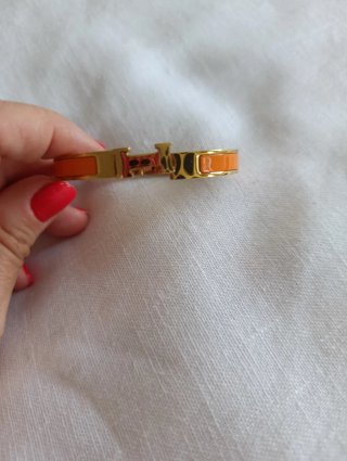 Pulsera Hermes Dorada con Detalles Naranja