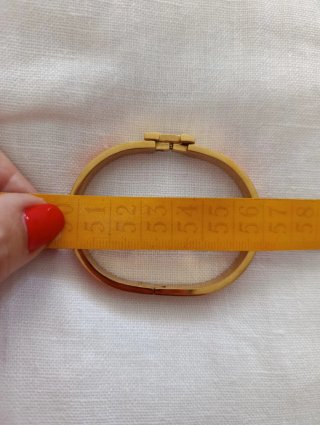 Pulsera Hermes Dorada con Detalles Naranja