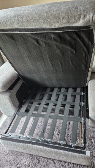Sofá cama gris de tela