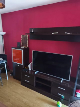 Mueble salón madera y cristal