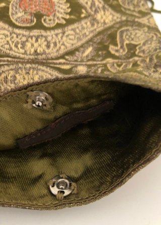Bolso mini de tela con flecos verde