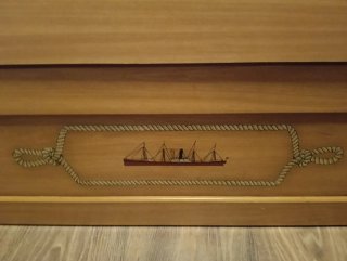 Cama nido de madera con cajones.
