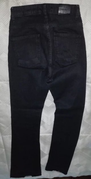 Pantalón vaquero flare negro mujer
