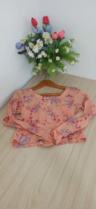 Blusa floreale arancione