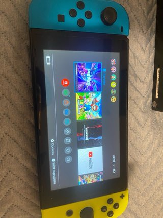Nintendo Switch Azul/Amarillo + Accesorios