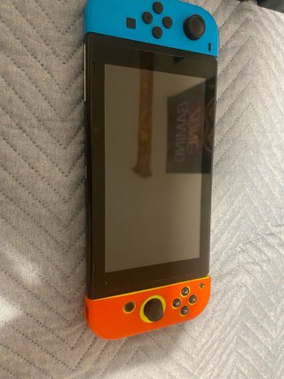 Nintendo Switch Azul/Amarillo + Accesorios