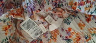Bermuda floral naranja y rosa