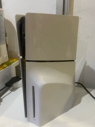 PlayStation 5 Slim + lector + Star Wars Outlaws