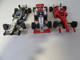 SCALEXTRIC LOTE 3 COCHES F1 Y CARRERA MCLAREN MP4