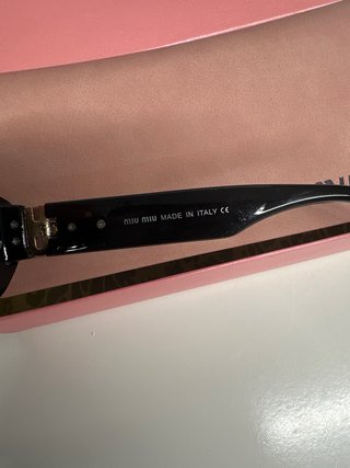 Óculos de Sol Miu Miu Pretos